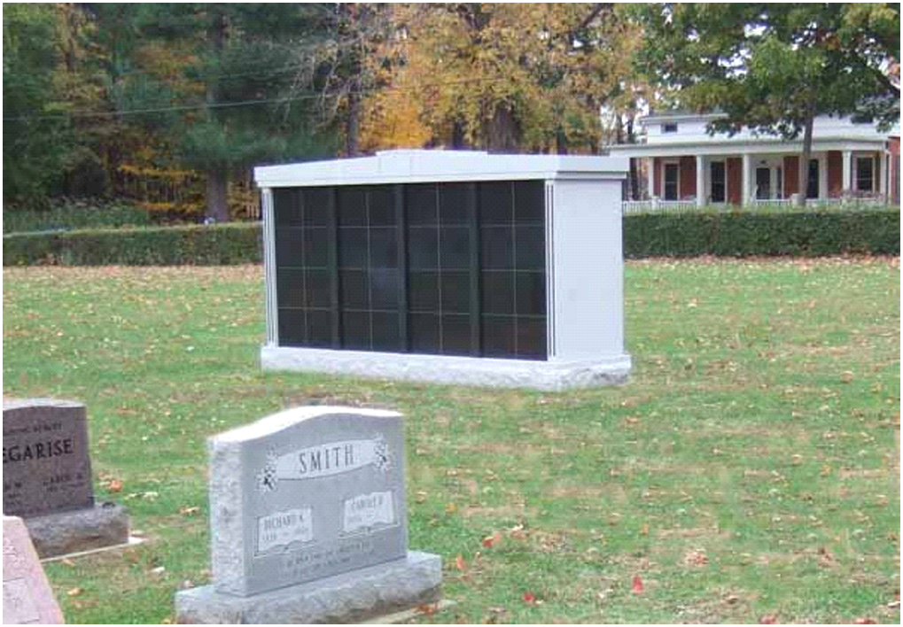 Close view of the Milan Cemetery columbarium niche face and engraved panels